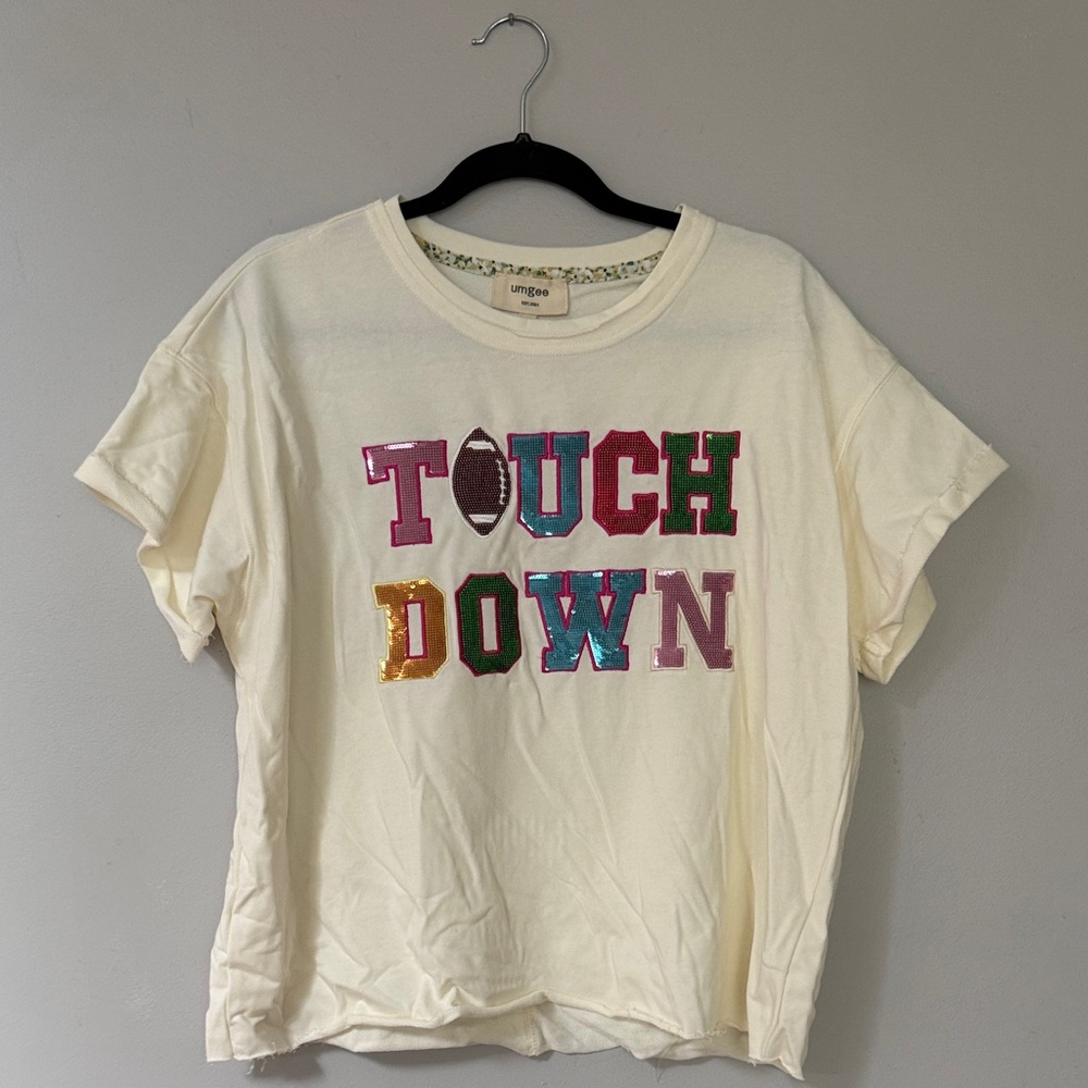 Umgee Cream Short Sleeve Tee with Multicolor 'TOUCH DOWN' Graphic
